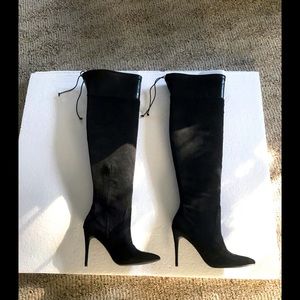 Thigh high black boots